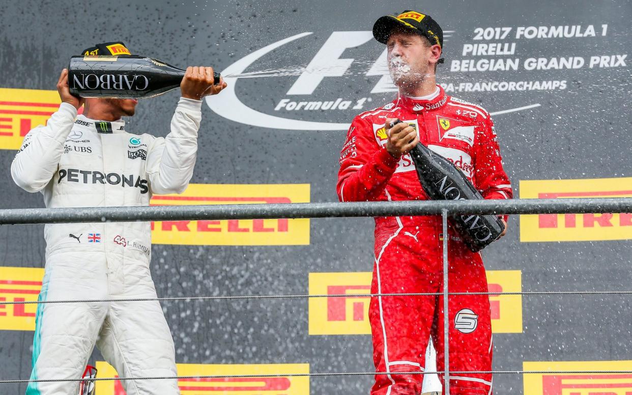 The winner, Lewis Hamilton (L) and second placed Sebastian Vettel - EPA