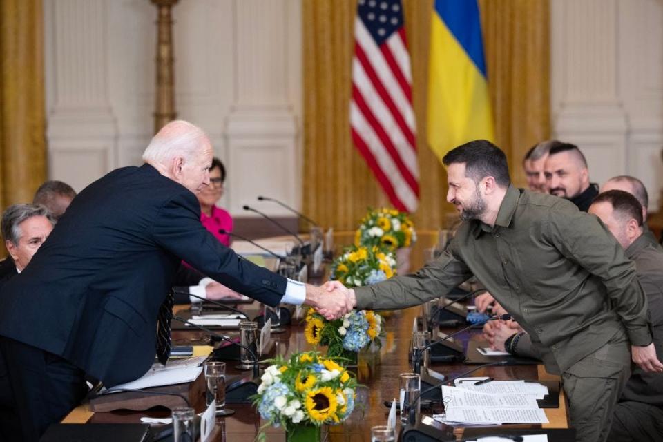 Ukrainian President Volodymyr Zelensky and President Joe Biden shake hands during a meeting inside the East Room at the White House on Thursday, September 21, 2023. Biden announced that Ukraine would be receiving American M1 Abrams tanks before 2024.