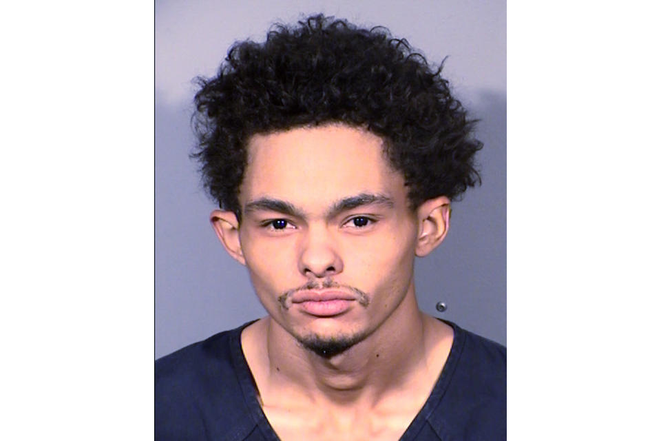 This undated photo provided by Las Vegas police shows Tyson Hampton, 24, of Las Vegas. Police say Hampton was arrested early Thursday, Oct. 13, 2022, as the suspect in a shooting that killed veteran Police Officer Truong Thai. (Las Vegas Metropolitan Police Department via AP)