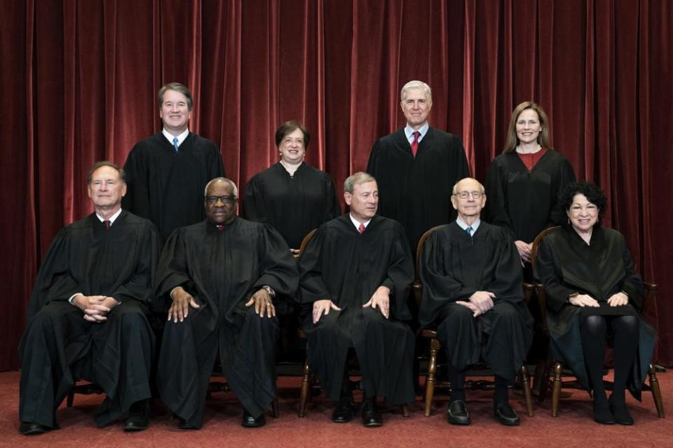 In this April 23, 2021, file photo, members of the Supreme Court pose for a group photo at the Supreme Court in Washington. (Erin Schaff/The New York Times via AP, Pool)