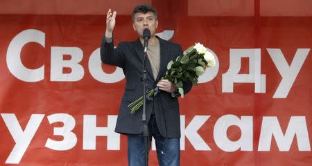 FILE PHOTO: Russian opposition leader Boris Nemtsov addresses supporters during a protest rally in Moscow, May 6, 2013. REUTERS/Sergei Karpukhin