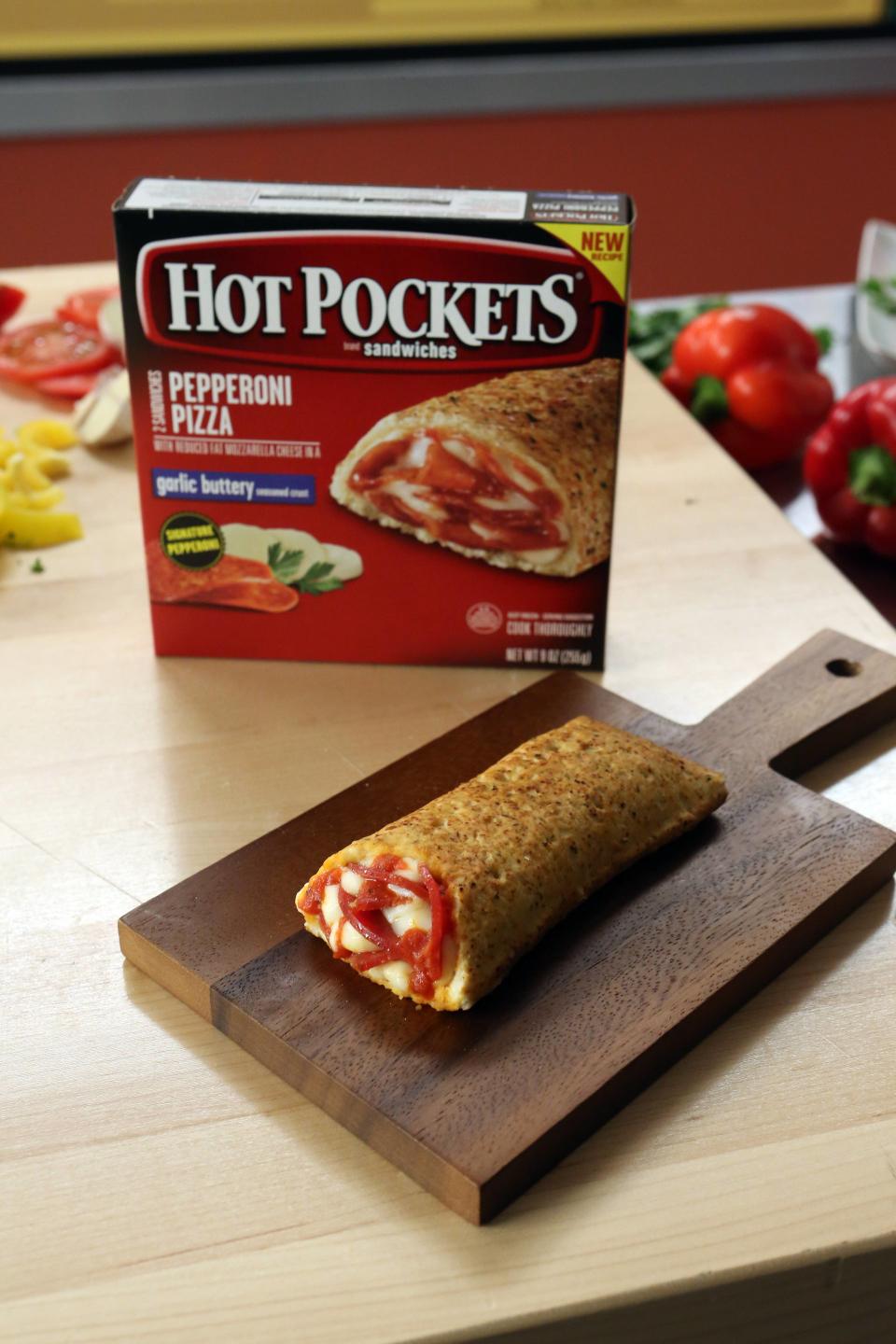 A Hot Pocket on a cutting board.