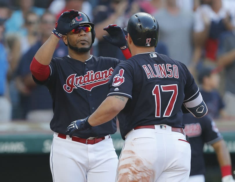 Edwin Encarnacion (left) and Yonder Alonso celebrate during Cleveland Indians AL Central-clinching victory. (Getty Images)