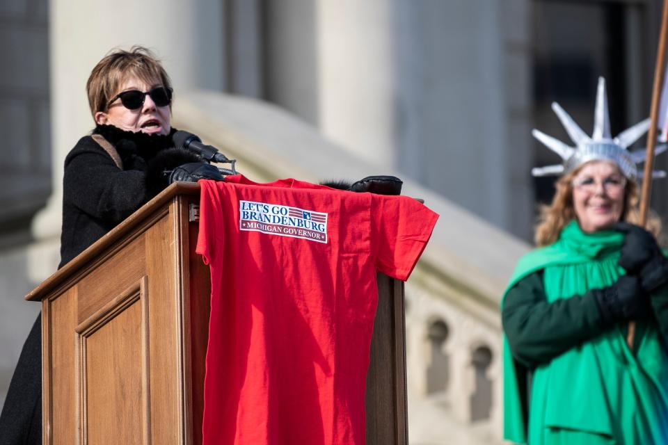 Republican gubernatorial candidate Donna Brandenburg speaks during a protest outside of the Michigan State Capitol in Lansing demanding a forensic audit on Feb. 8, 2022.
