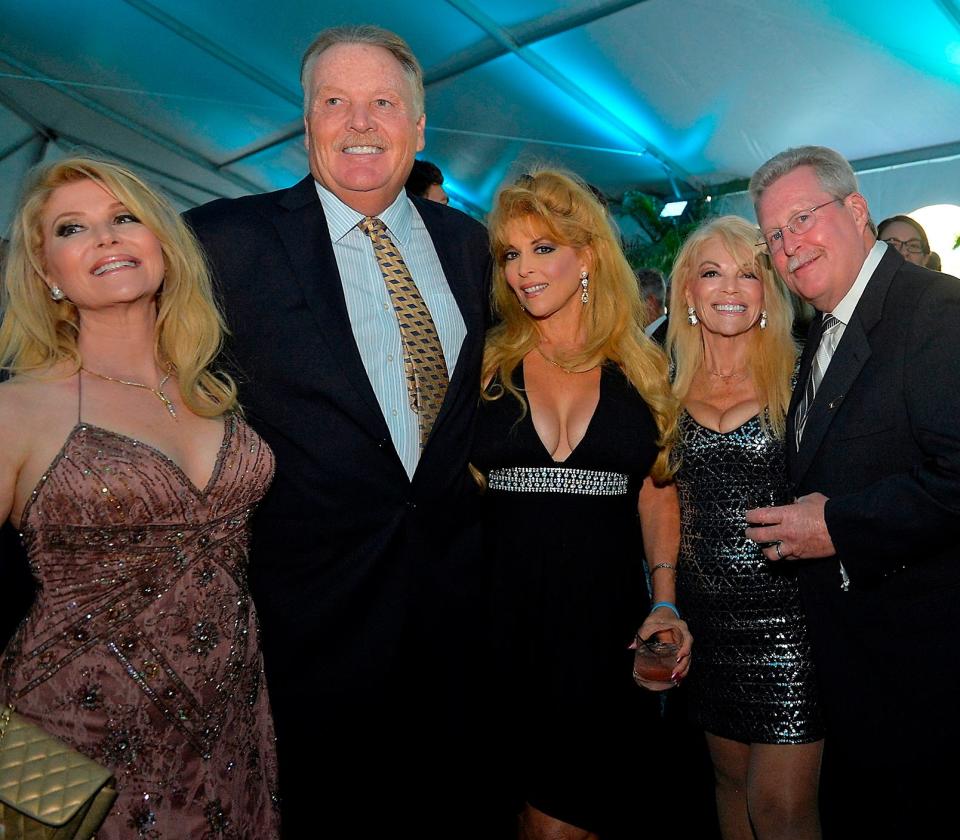 Audrey, Judy and Ruth Landers hang with the guys, including Judy's husband, retired Major League Baseball pitcher Tom Niedenfuer, second to left, during the 9th Annual Dick Vitale Gala on May 16, 2014 at the Ritz Carlton Sarasota.