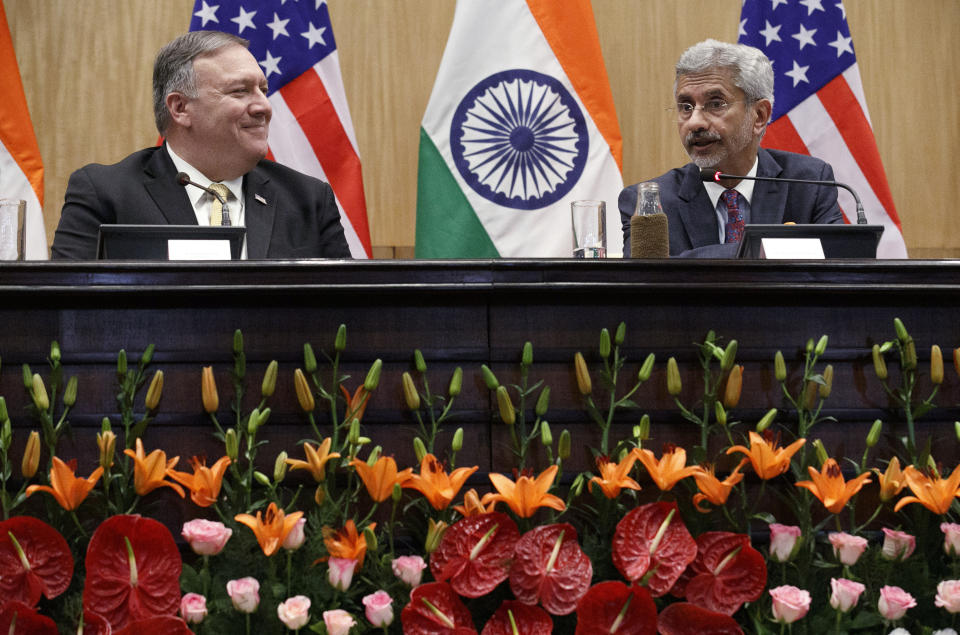 U.S. Secretary of State Mike Pompeo, left, attends a news conference with Indian counterpart Subrahmanyam Jaishankar, at the Foreign Ministry in New Delhi, India, Wednesday, June 26, 2019. Pompeo held meetings in India's capital on Wednesday amid growing tensions over trade and tariffs that has strained the partners' ties. (AP Photo/Jacquelyn Martin, Pool)