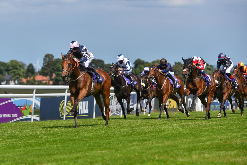 BEVERLEY, ENGLAND - JUNE 23: Jockey Danny Tudhope riding Le Chiffre approach the finish line to win the William Hill Lengthen #yourodds Handicap (Div I) at Beverley Racecourse on June 23, 2020 in Beverley, England. (Photo by Hannah Ali/Pool via Getty Images)