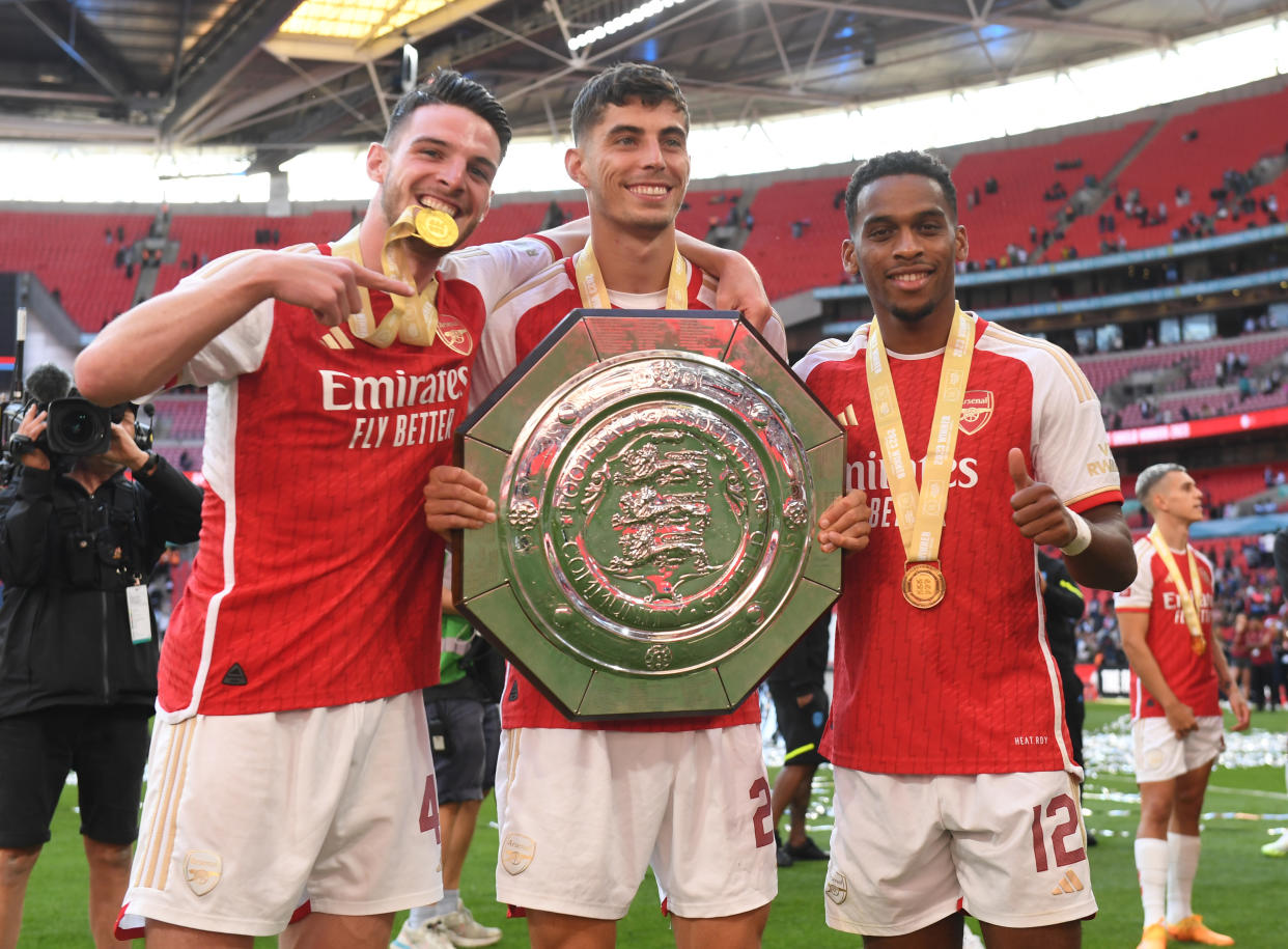 Arsenal's new signings (from left) Declan Rice, Kai Havertz and Jurrien Timber celebrate winning the Community Shield trophy against Manchester City. 