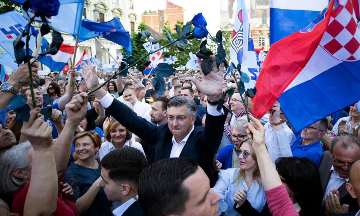 <span>The incumbent prime minister, Andrej Plenković, arriving for a rally in Zagreb on Sunday.</span><span>Photograph: AFP/Getty Images</span>