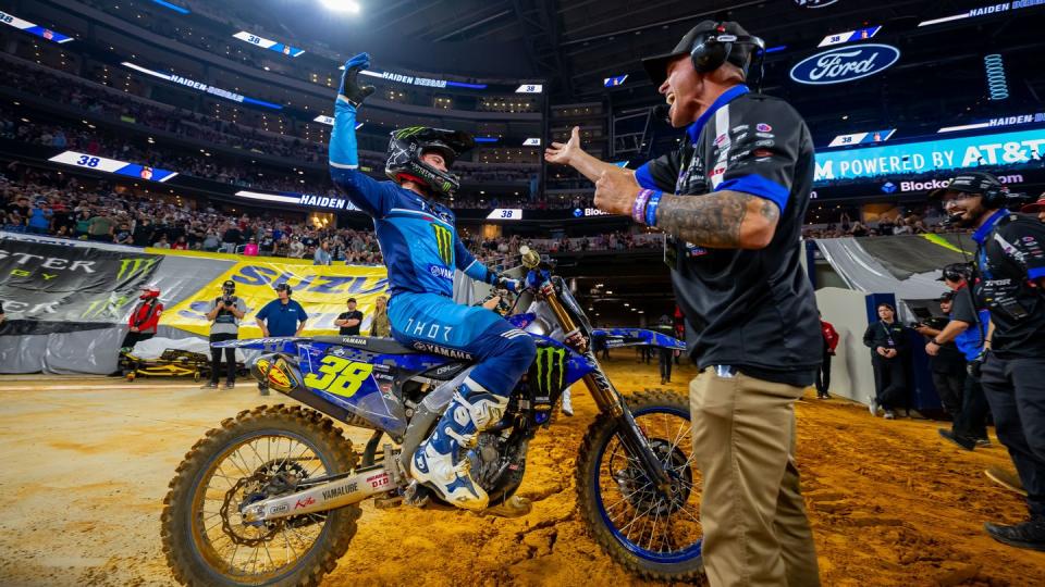 haiden deegan high fives his father brian deegan after first supercross victory