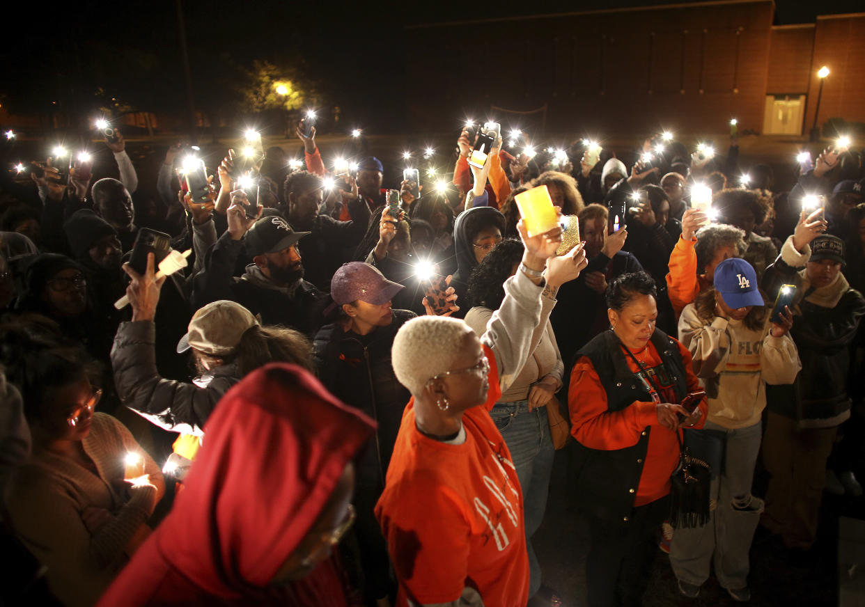 Scores of friends and family attend a vigil for Virginian-Pilot reporter Sierra Jenkins on Sunday, March 20, 2022, at Granby High School in Norfolk, Va. Jenkins died at a Norfolk hospital after being shot during a shooting early Saturday outside a restaurant and bar. (Stephen M. Katz/The Virginian-Pilot via AP)