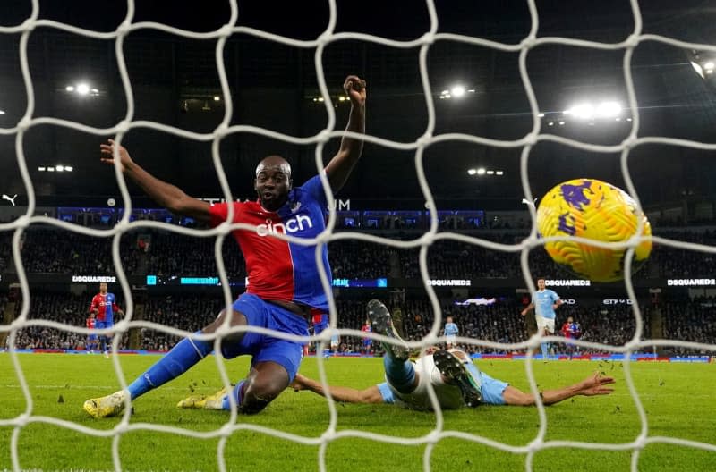 Crystal Palace's Jean-Philippe Mateta scores his sides first goal during the English Premier League soccer match between Manchester City and Crystal Palace at the Etihad Stadium. Martin Rickett/PA Wire/dpa