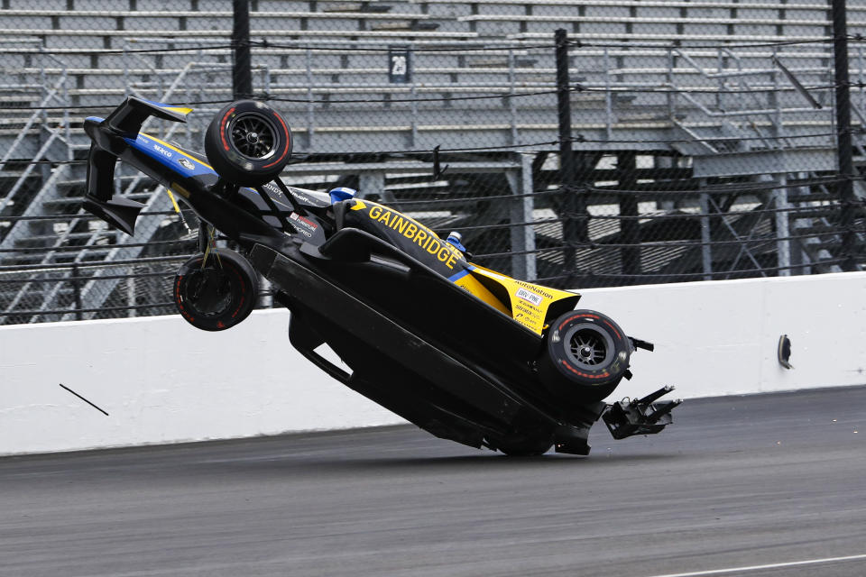 Colton Herta crashes in the first turn during the final practice for the Indianapolis 500 auto race at Indianapolis Motor Speedway in Indianapolis, Friday, May 27, 2022. (AP Photo/Kirk DeBrunner)