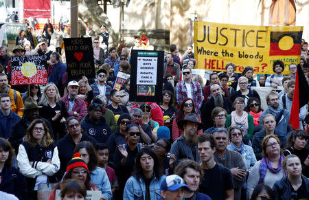 Demonstrators gather outside Sydney's Town Hall to protest against alleged child abuse in Australia's Northern Territory detention centers, July 30, 2016. REUTERS/Jason Reed