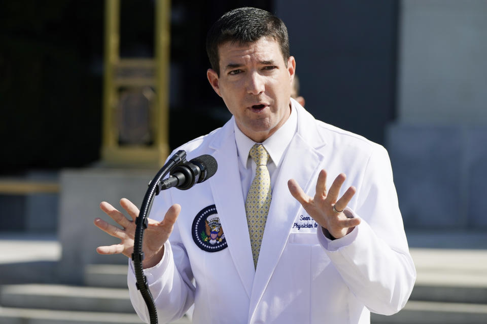 Dr. Sean Conley briefs reporters at Walter Reed National Military Medical Center in Bethesda, Md.