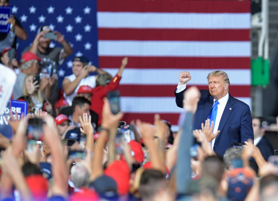 President Donald Trump waves to the crowd as he leaves Thursday, September 24, 2020 at the Great American Comeback Event at the Cecil Commerce Center in Jacksonville, Florida. (Will Dickey/Florida Times-Union)