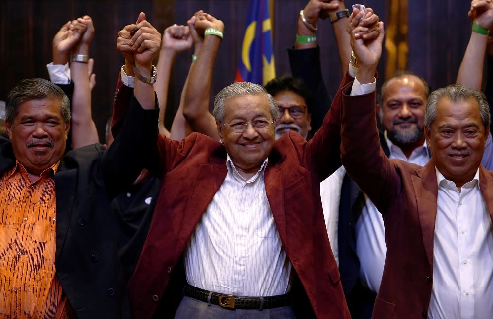 Tun Dr Mahathir Mohamad reacts during a news conference in Petaling Jaya May 10, 2018.  — Reuters pic