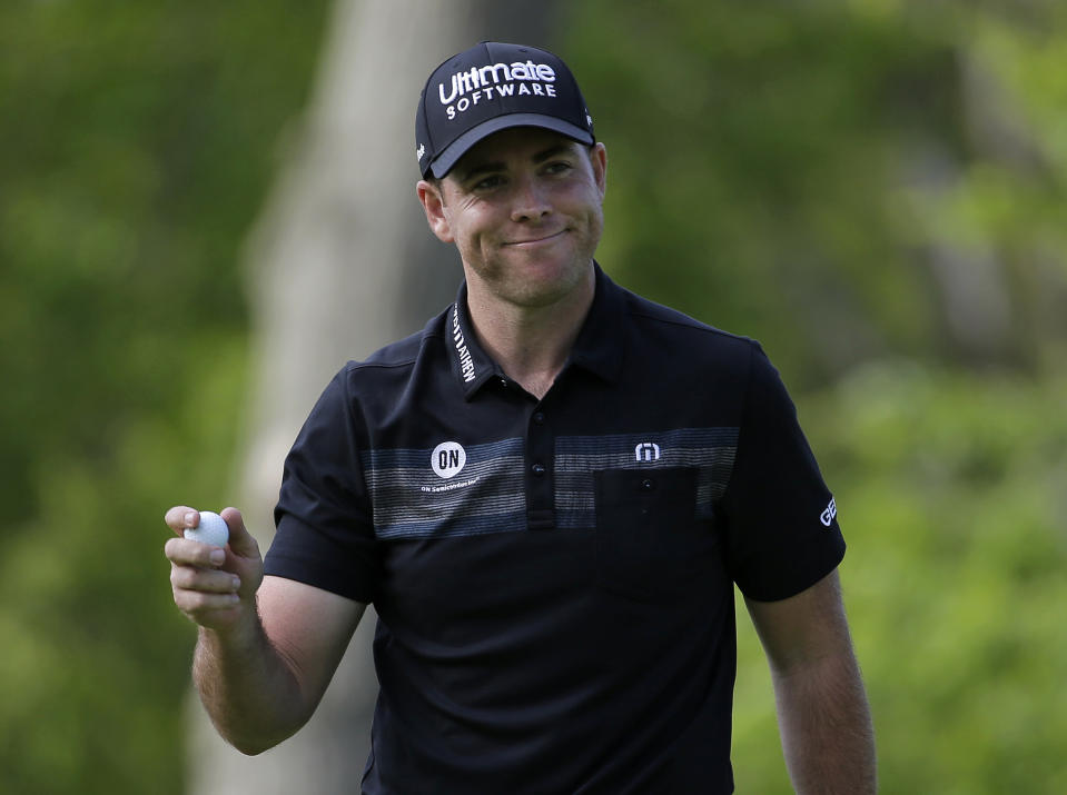 Luke List reacts after sinking a putt on the 14th green during the third round of the PGA Championship golf tournament, Saturday, May 18, 2019, at Bethpage Black in Farmingdale, N.Y. (AP Photo/Seth Wenig)