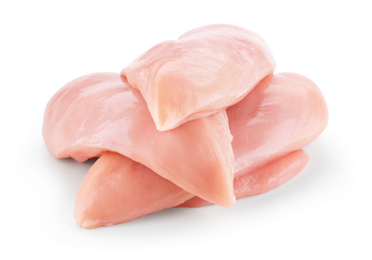 Chicken breast isolated. Raw chicken fillet on white background. Poultry raw. Chicken meat with clipping path.