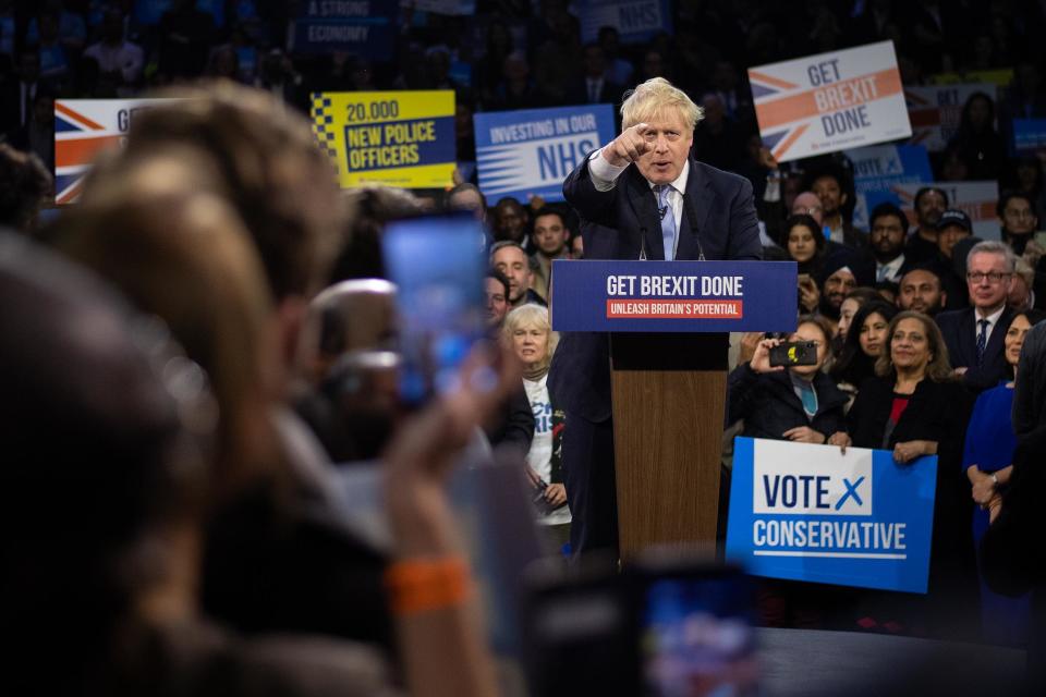 Boris Johnson speaks to supporters at the Copper Box Arena in London on the eve of the election (Getty Images)