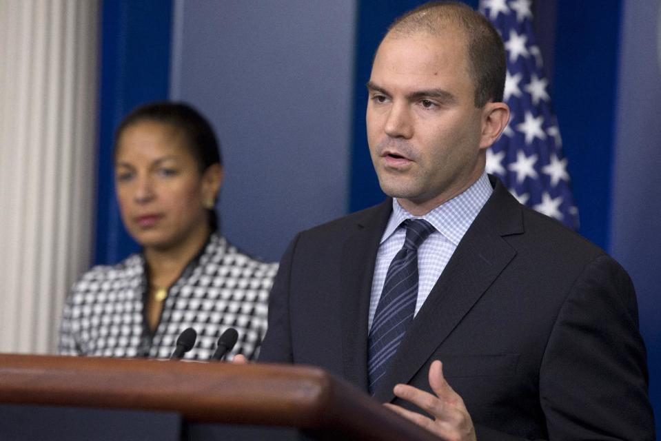 Ben Rhodes, deputy National Security Adviser for Strategic Communications and Speechwriting, right, accompanied by National Security Adviser Susan Rice, speaks about President Barack Obama's upcoming trip to Asia, Friday April 18, 2014 , at the White House briefing room in Washington. (AP Photo/Jacquelyn Martin)