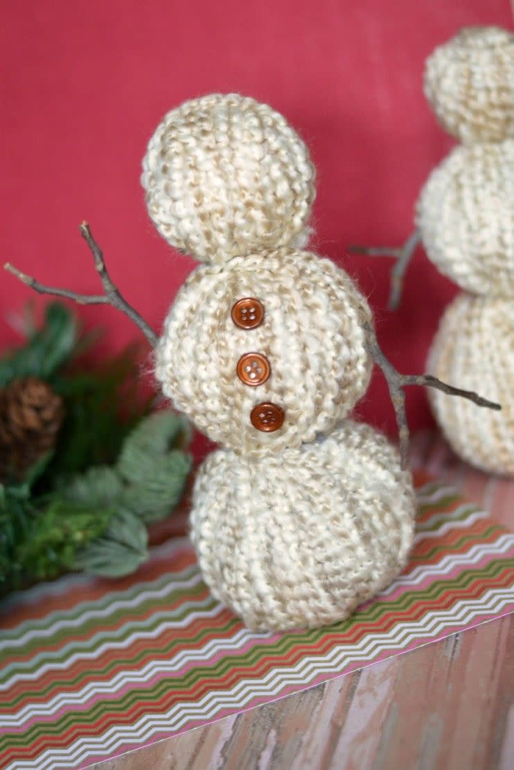 <p>Customize these snowmen to match the Christmas colors you've chosen for the other <a href="https://www.countryliving.com/home-design/decorating-ideas/advice/g1247/holiday-decorating-1208/" rel="nofollow noopener" target="_blank" data-ylk="slk:holiday decor;elm:context_link;itc:0;sec:content-canvas" class="link ">holiday decor</a> in your home.</p><p><strong>Get the tutorial at <a href="http://www.frugalmomeh.com/2015/11/yarn-wrapped-snowmen.html" rel="nofollow noopener" target="_blank" data-ylk="slk:Frugal Mom Eh;elm:context_link;itc:0;sec:content-canvas" class="link ">Frugal Mom Eh</a>.</strong></p><p><a class="link " href="https://www.amazon.com/Lion-Brand-Yarn-792-412-Homespun/dp/B0091UDG10?tag=syn-yahoo-20&ascsubtag=%5Bartid%7C10050.g.22825300%5Bsrc%7Cyahoo-us" rel="nofollow noopener" target="_blank" data-ylk="slk:SHOP YARN;elm:context_link;itc:0;sec:content-canvas">SHOP YARN</a></p>