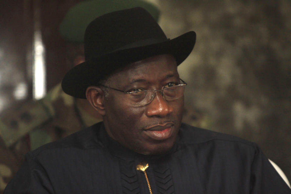 FILE - In this Feb. 27, 2012 file photo, Nigerian President Goodluck Jonathan, visits Koluama 2 village, in Nigeria. Local and international groups fighting AIDS warned on Tuesday, Jan. 14, 2014, that a new Nigerian law criminalizing same-sex marriage and gay organizations will jeopardize the fight against the deadly disease. President Jonathan's spokesman confirmed Monday that he had signed the Same Sex Marriage Prohibition Act on Jan. 7, 2014, providing penalties of up to 14 years in jail for a gay marriage and up to 10 years' imprisonment for membership or encouragement of gay club, societies and organizations.(AP Photo/Sunday Alamba, File)