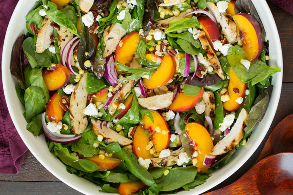 <p>Cooking Classy</p><p>This <strong>Fresh Peach Salad </strong>is topped with grilled basil chicken and a sweet and tangy white balsamic vinaigrette. This grilled chicken salad can be served as a side dish or an entree and is the perfect way to use up end-of-summer peaches! </p><p><strong>Recipe here: </strong><strong><a href="http://www.cookingclassy.com/peach-salad-with-grilled-basil-chicken-and-white-balsamic-honey-vinaigrette/" rel="nofollow noopener" target="_blank" data-ylk="slk:Peach Salad with Grilled Basil Chicken;elm:context_link;itc:0;sec:content-canvas" class="link ">Peach Salad with Grilled Basil Chicken</a></strong></p>