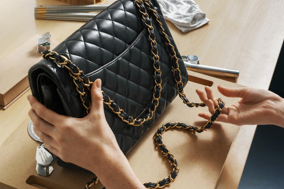 A Chanel purse gets examined by the Vestiaire Collective team. - Credit: Courtesy Vestiare Collective