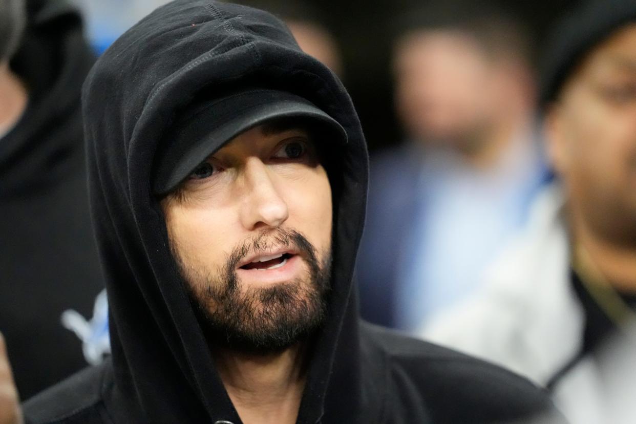 Eminem, a Detroit Lions fan, is shown during the pregame of an NFL wild-card playoff football game against the Los Angeles Rams, Sunday, Jan. 14, 2024, in Detroit.