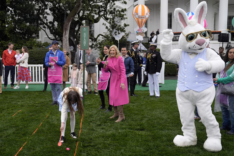 First lady Jill Biden, center, participates in the White House Easter Egg Roll on the South Lawn of the White House, Monday, April 1, 2024, in Washington. (AP Photo/Evan Vucci)