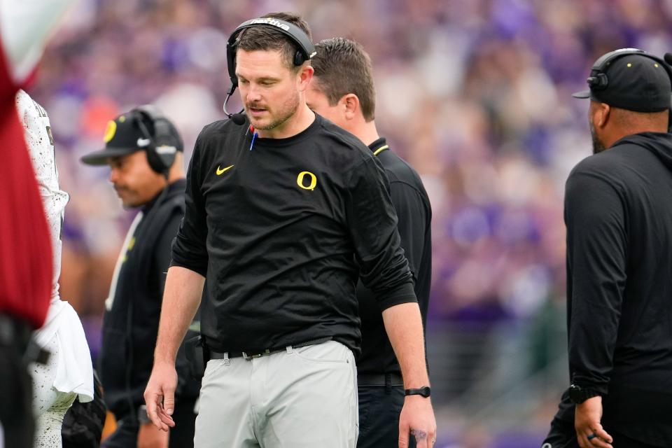 Oregon head coach Dan Lanning looks down during the second half of the game against Washington on Oct. 14 in Seattle. Washington won 36-33.