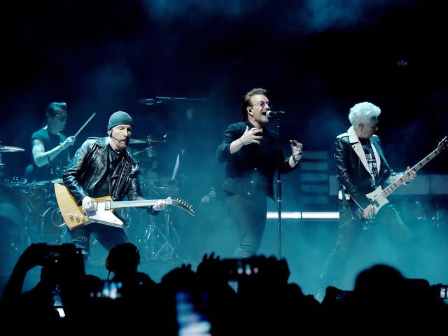 <p>Kevin Mazur/Getty</p> U2 performs at Madison Square Garden in New York City on July 1, 2018