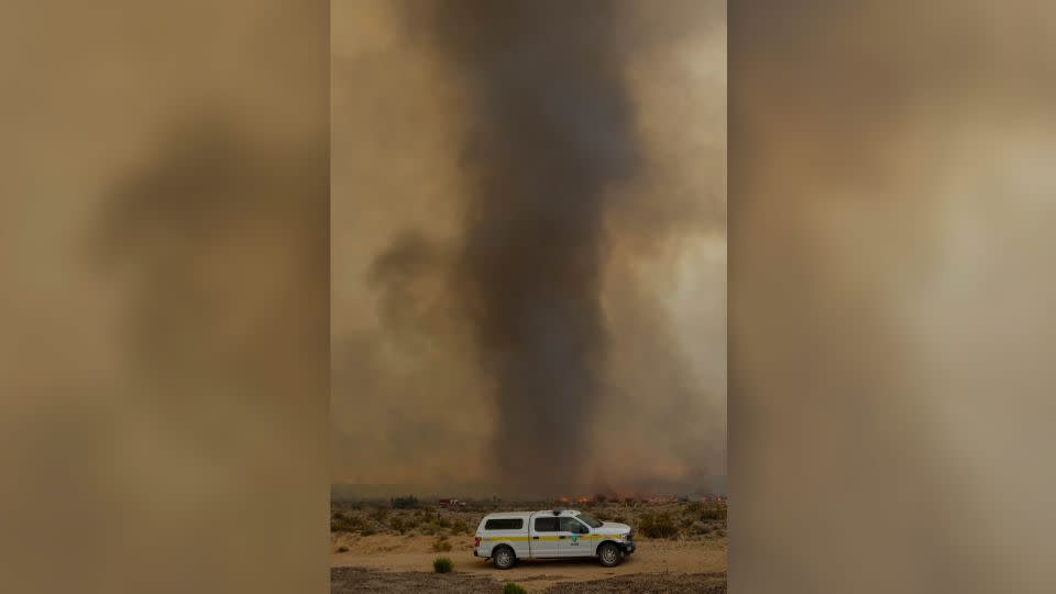 Crews battlling the York Fire faced "fire whirls" Sunday in the Mojave National Preserve, California. - Ty O'Neil/AP