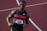 Trayvon Bromell wins the second heat of the men's 100-meter run at the U.S. Olympic Track and Field Trials Saturday, June 19, 2021, in Eugene, Ore. (AP Photo/Chris Carlson)