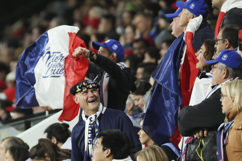 French supporters react during the Women's World Cup round of 16 soccer match between France and Morocco in Adelaide, Australia, Tuesday, Aug. 8, 2023. (AP Photo/James Elsby)