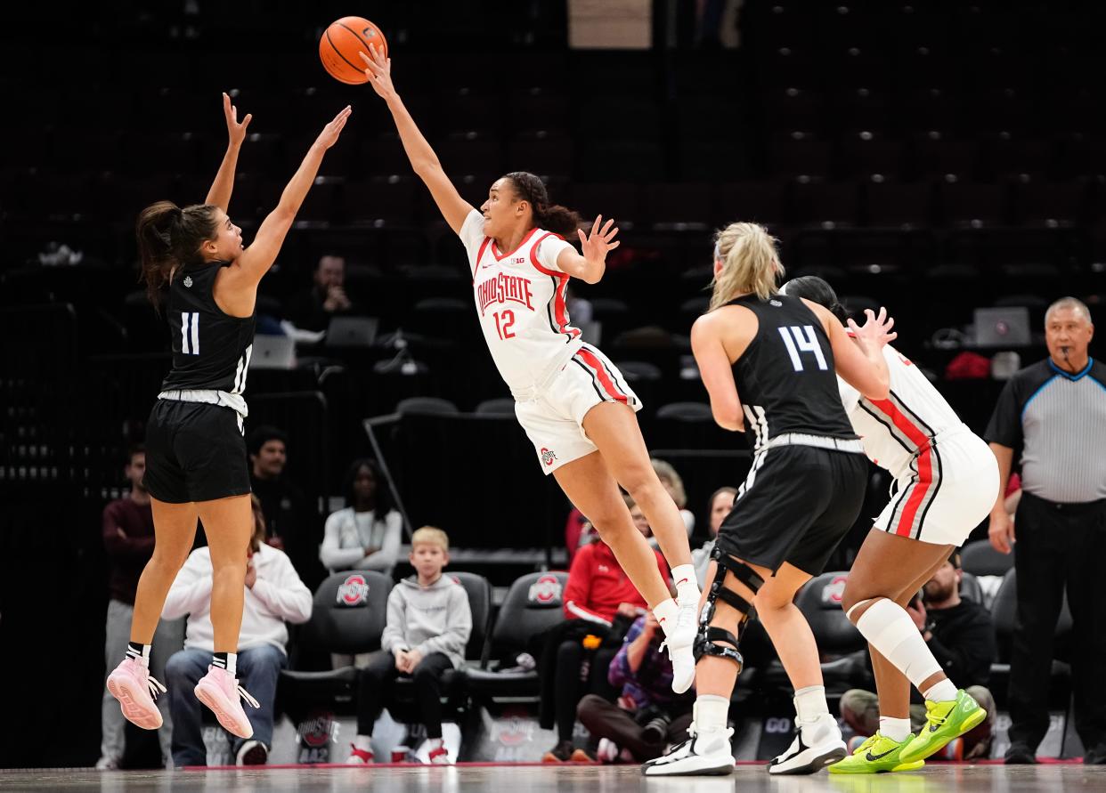 Guard Celeste Taylor (12) and her Ohio State teammates are forcing an average of 22 turnovers a game.