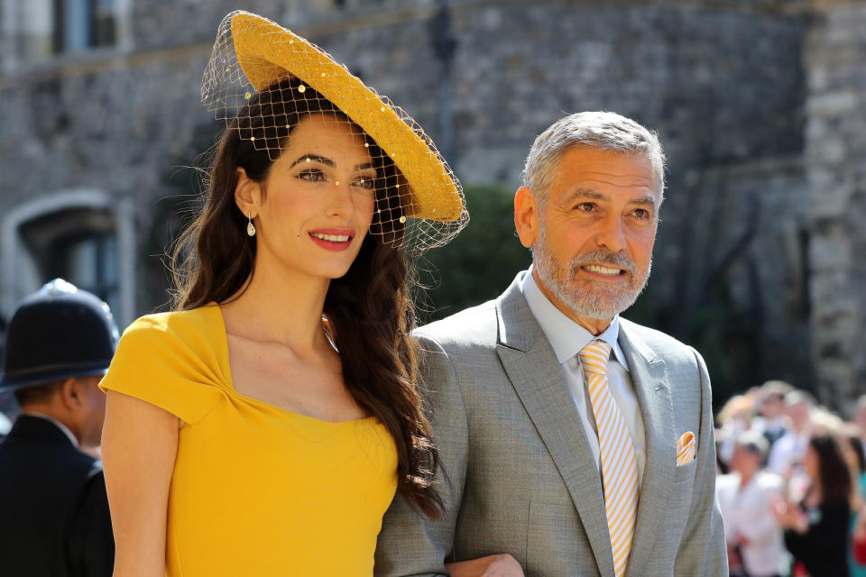 Amal Clooney, at the royal wedding with her actor husband, George, was recognized for her work as a human rights lawyer. (Photo: Gareth Fuller — WPA Pool/Getty Images)