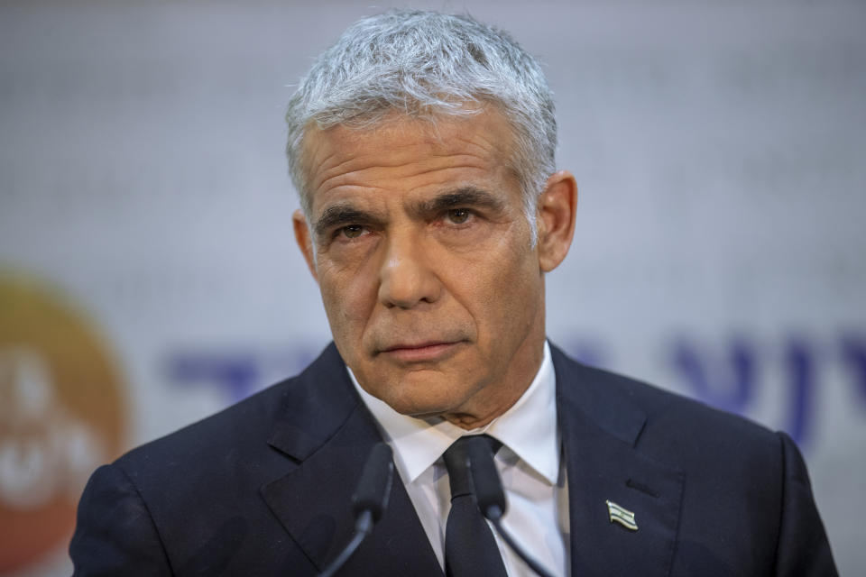 REPLACES COMMON GOOD INSTEAD OF COMMON GROUND - Israeli opposition leader Yair Lapid, speaks during a news conference in Tel Aviv, Thursday, May. 6, 2021. Lapid called on his potential partners to find "common good" and expressed optimism that a new coalition government would be formed. (AP Photo/Oded Balilty)