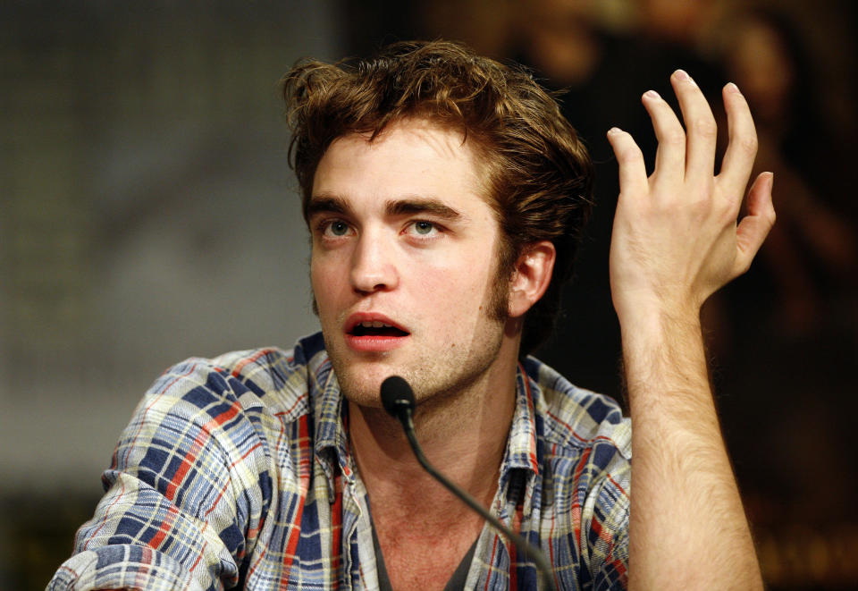 Actor Robert Pattinson from the upcoming movie "The Twilight Saga: New Moon" attends a news conference during the 40th annual Comic Con Convention in San Diego July 23, 2009.  The convention runs July 23-26.  REUTERS/Mario Anzuoni   (UNITED STATES ENTERTAINMENT)