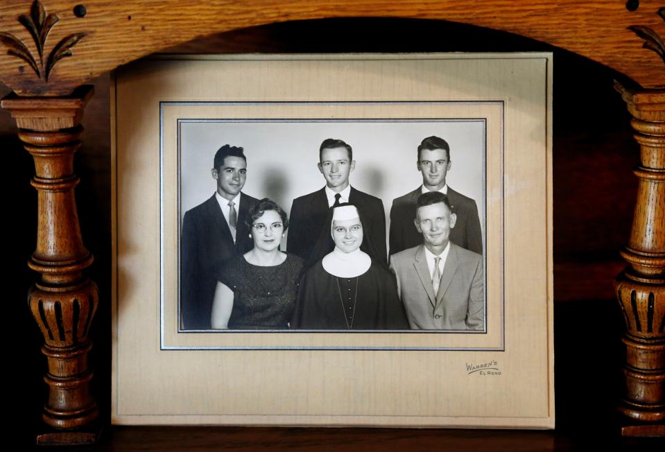 Portrait of Rev. Stanley Rother, middle person in back row, and his family taken in the 1960s. Front row, from left, his mother, Gertrude, his sister, Elizabeth Mary (Sr. Marita) and his father, Franz.  Back row are his brothers, Tom, left, and Jim, now deceased.   Photo by Jim Beckel, The Oklahoman 