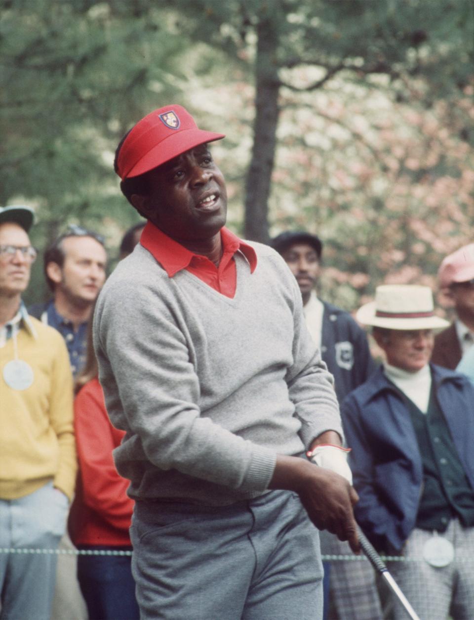 Lee Elder watches a shot at the 1975 Masters.