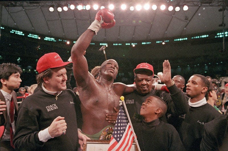 In this Feb. 11, 1990, file photo, James "Buster" Douglas is shown in the ring after defeating Mike Tyson in a stunning upset to win the heavyweight title at the Tokyo Dome in Tokyo.  Douglas, a Columbus native, is scheduled to attend the Brawl at the Hall of Fame Village boxing event in Canton on March 11.