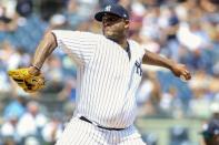 Aug 12, 2018; Bronx, NY, USA; New York Yankees pitcher CC Sabathia (52) pitches in the first inning against the Texas Rangers at Yankee Stadium. Wendell Cruz-USA TODAY Sports