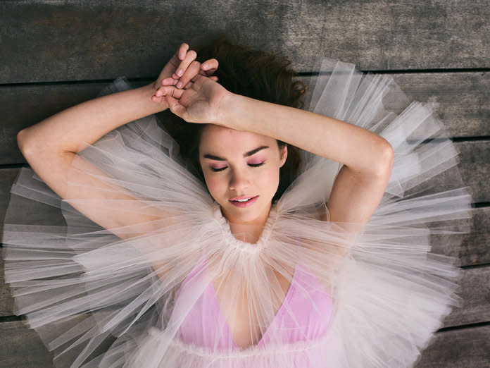 <p>Maia Mitchell in a Louiza Babouryan dress and an Araks&nbsp;bodysuit.&nbsp;Photo by Eric T. White.</p>