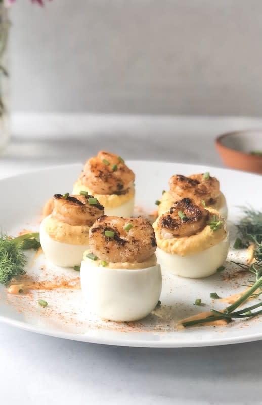 <p>Seasoned To Taste</p><p>Sharing a staple known to have a designated place at every soul food family gathering! Add a tasty twist to traditional deviled eggs with fresh herbs, lemon and pepper sauce topped with buttered cajun-creole shrimp!</p><p><strong>Get the recipe: <a href="https://www.seasonedtotasteblog.com/cajun-shrimp-deviled-eggs/" rel="nofollow noopener" target="_blank" data-ylk="slk:Cajun Shrimp Deviled Eggs;elm:context_link;itc:0;sec:content-canvas" class="link rapid-noclick-resp">Cajun Shrimp Deviled Eggs</a></strong></p><p><strong>Related: <a href="https://parade.com/992211/kristamarshall/best-cajun-recipes/" rel="nofollow noopener" target="_blank" data-ylk="slk:45 Best Cajun Recipes;elm:context_link;itc:0;sec:content-canvas" class="link rapid-noclick-resp">45 Best Cajun Recipes</a></strong></p>