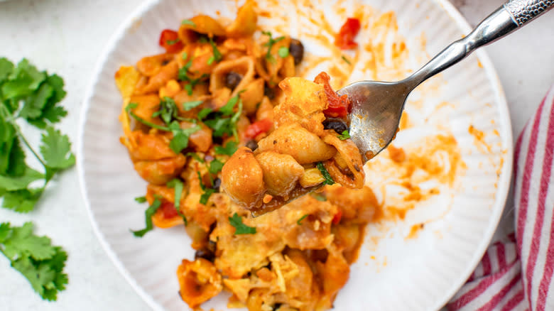 Black Bean and Corn Taco Pasta  on white plate with fork