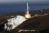 REFILE - ADDING ADDITIONAL CAPTION INFORMATION A Falcon 9 rocket carrying a small science satellite for Canada is seen as it is launched from a newly refurbished launch pad in Vandenberg Air Force Station September 29, 2013. The unmanned rocket blasted off from California on Sunday to test upgrades needed for planned commercial launch services. The 22-story rocket, built and flown by Space Exploration Technologies, or SpaceX, soared off a newly refurbished, leased launch pad at Vandenberg Air Force Station at noon EDT/1600 GMT (05.00 p.m. British time). REUTERS/Gene Blevins (UNITED STATES - Tags: SCIENCE TECHNOLOGY)