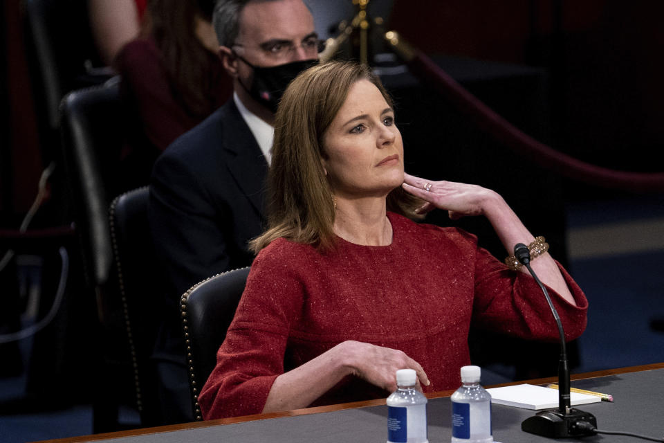 Supreme Court nominee Amy Coney Barrett listens during a confirmation hearing before the Senate Judiciary Committee, Tuesday, Oct. 13, 2020, on Capitol Hill in Washington. (Erin Schaff/The New York Times via AP, Pool)