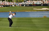 PALM BEACH GARDENS, FL - MARCH 02: Justin Rose of England hits his approach shot on the 16th hole during the second round of the Honda Classic at PGA National on March 2, 2012 in Palm Beach Gardens, Florida. (Photo by Mike Ehrmann/Getty Images)